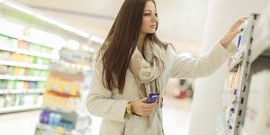 Young woman buying personal care products