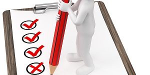 Männchen mit Fragebogen