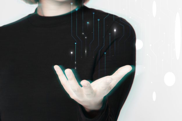 Glitching woman’s hand background using futuristic technol